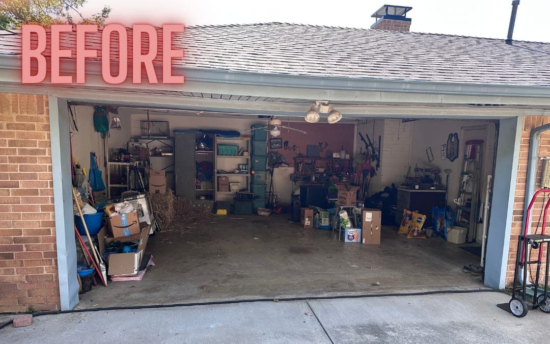 Before: a two-car garage full of shelving and stored items